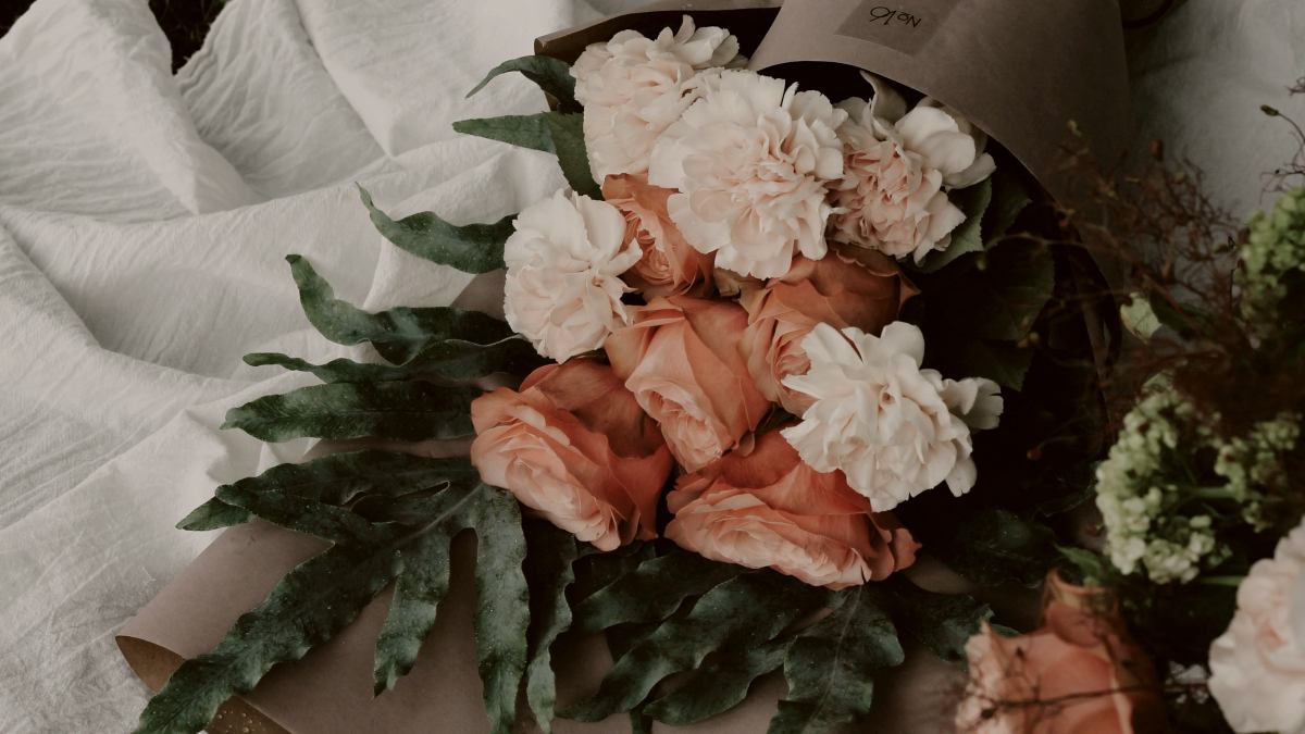 
a-bouquet-of-peach-and-white-roses
