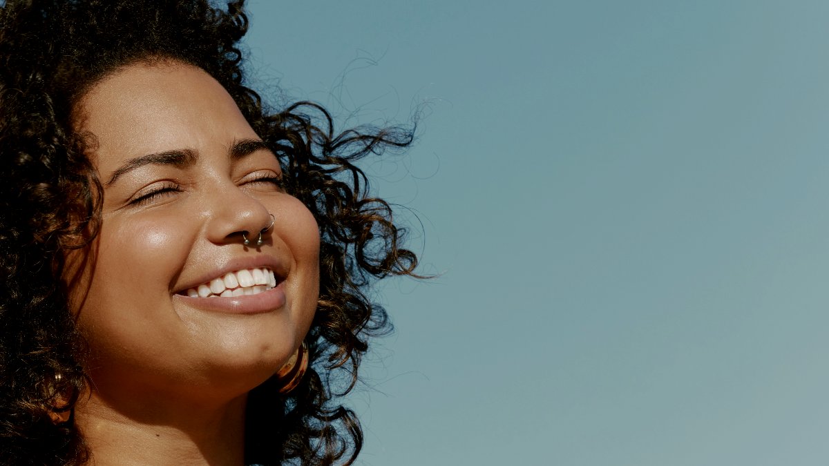 A Psychologist Explains How Being ‘Too Happy’ Can Backfire