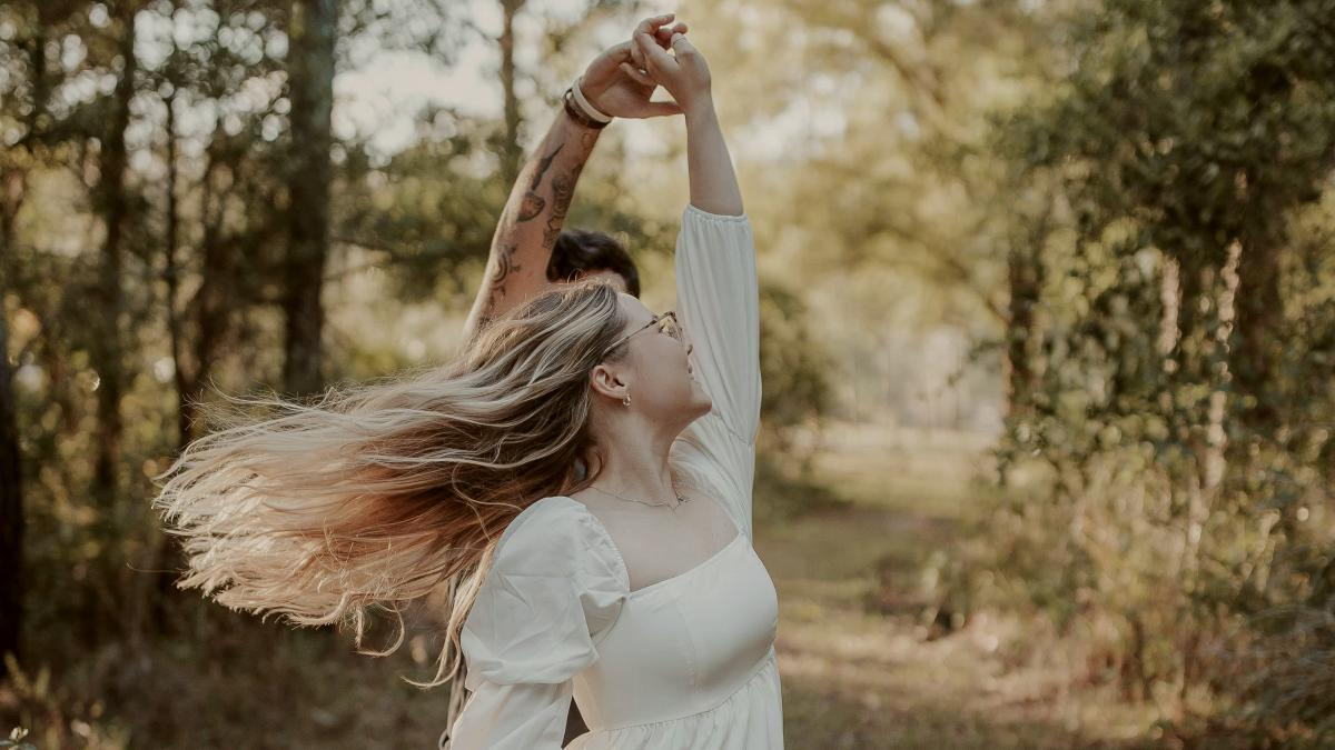 
a-couple-dancing-together-in-the-forest
