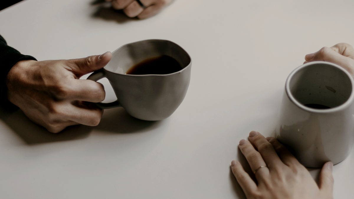 
a-couple-enjoying-their-coffee-together
