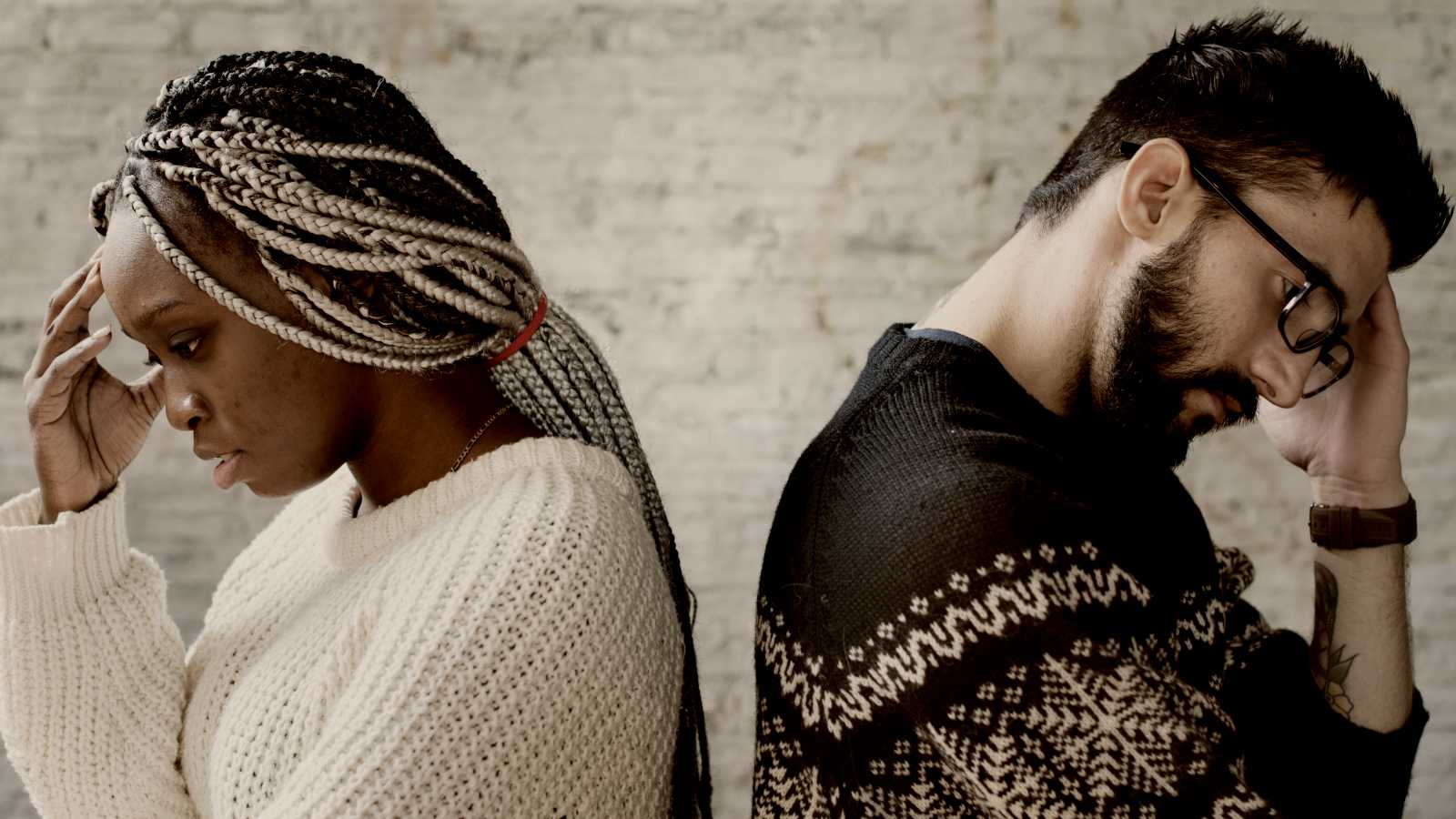 
A couple having an argument with backs turned by Curated Lifestyle
