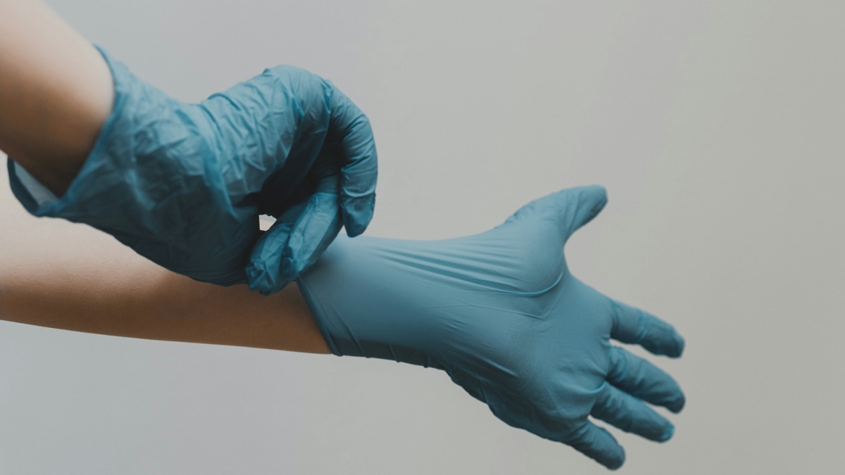 
a doctor's gloves symbolizing how gypsy rose blanchard suffered at her mother's hands
