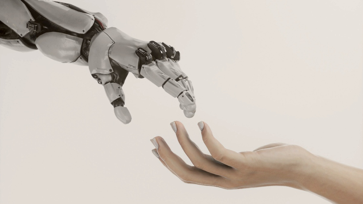 
a hand reaching out towards a robot hand against a white background by Cash Macananya
