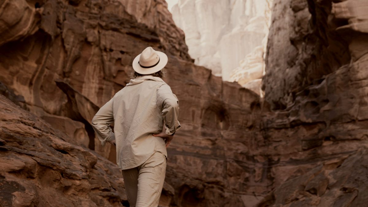 
a hiker pondering which path they should choose
