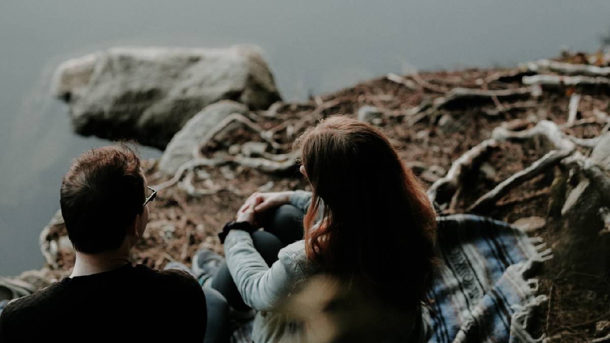 
A man and woman having a deep conversation about how to improve their relationship and possibly going to couples therapy
