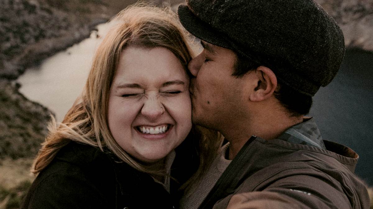 
a-man-and-woman-taking-a-selfie-in-the-mountains
