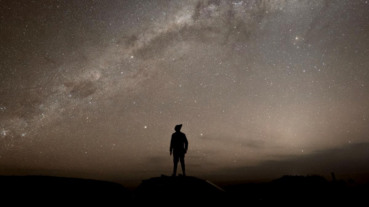 
a-person-staring-at-the-milky-way-in-the-night-sky
