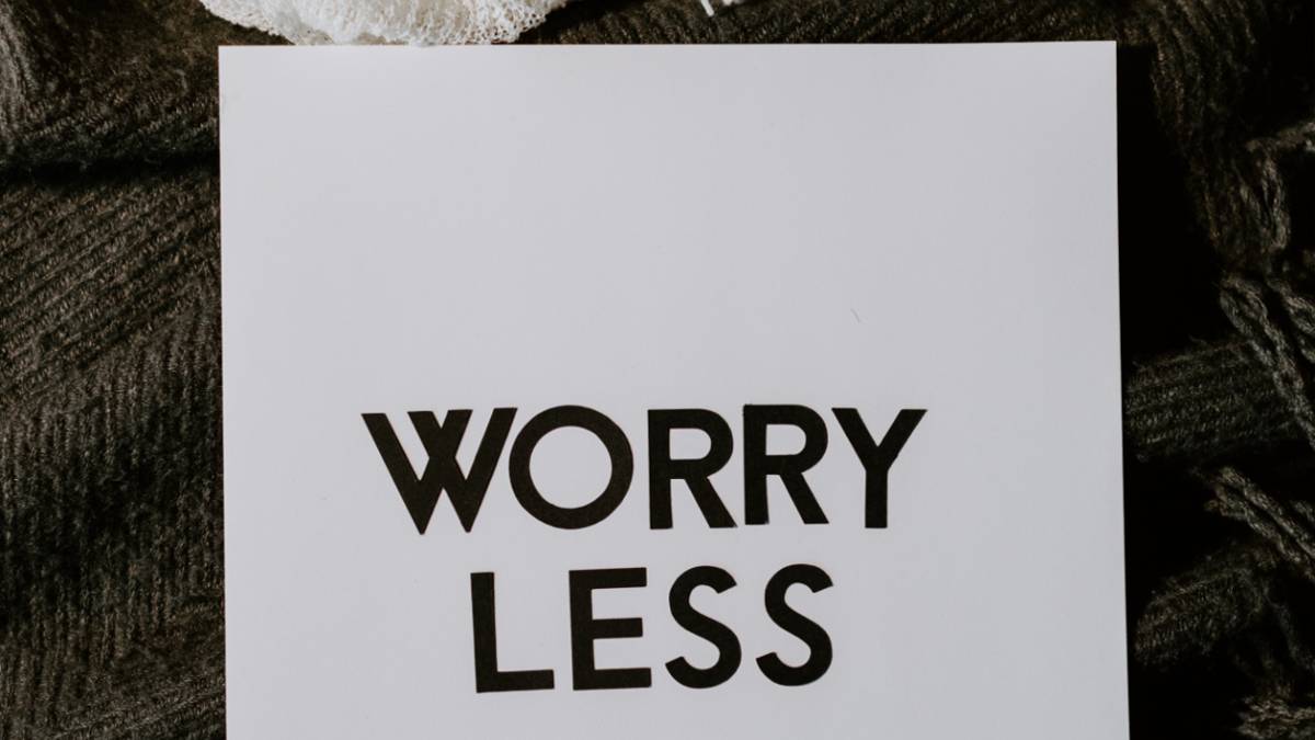 
A sign that says worry less and is encouraging people with social anxiety disorder to make new friends.

