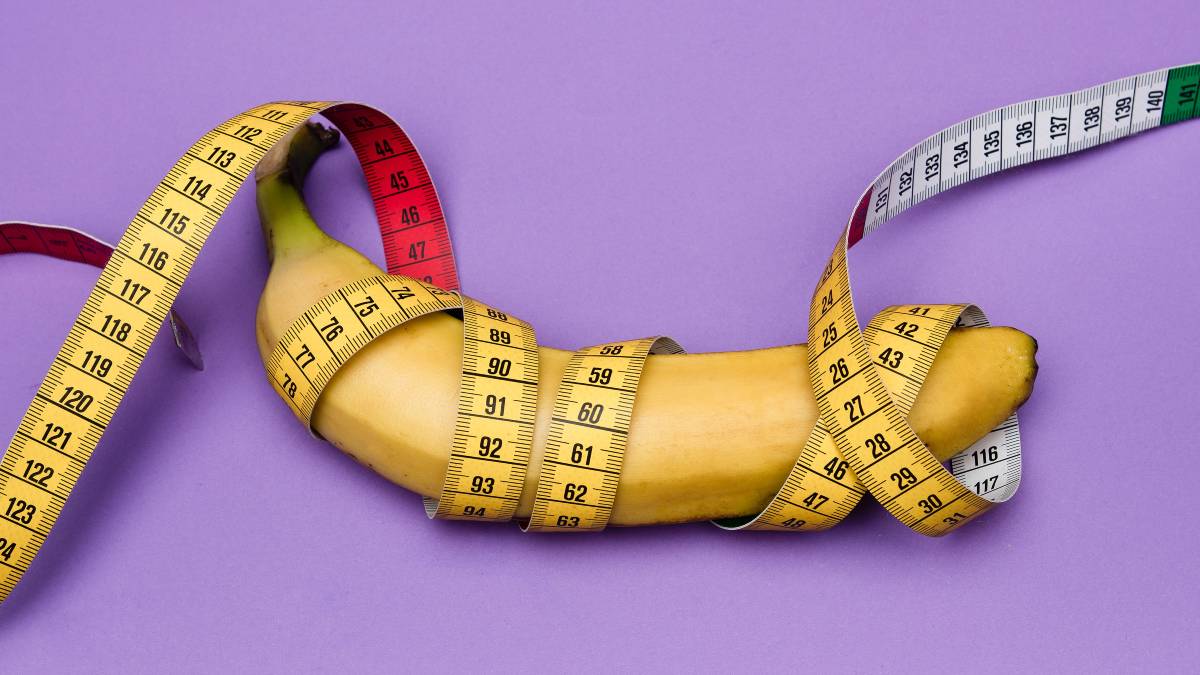 
a tape measure and a banana, serving as a metaphor for men's obsession with penis size
