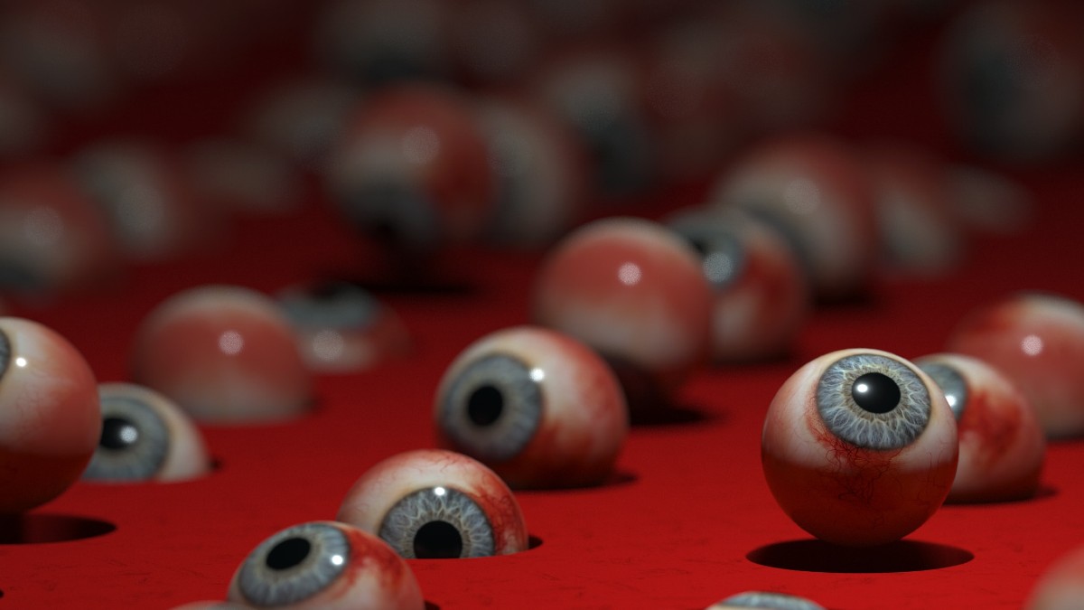 
a tray full of prosthetic human eyeballs representing the constant and repetitive consumption on social media
