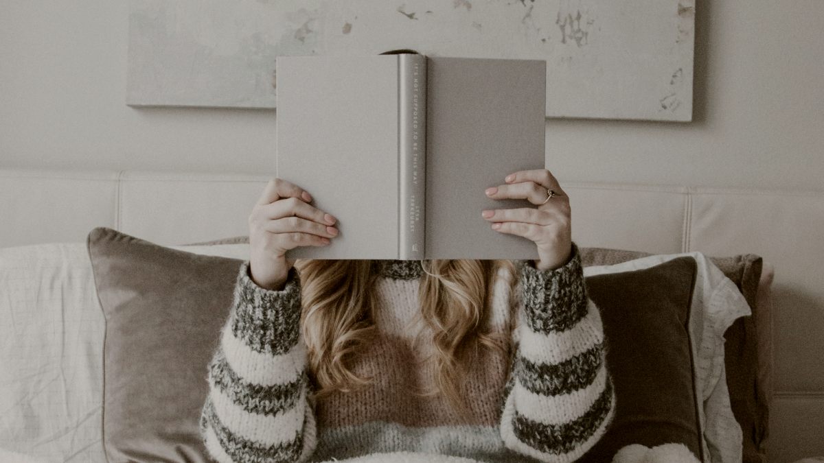 
a-woman-enjoying-some-time-alone-reading-in-bed
