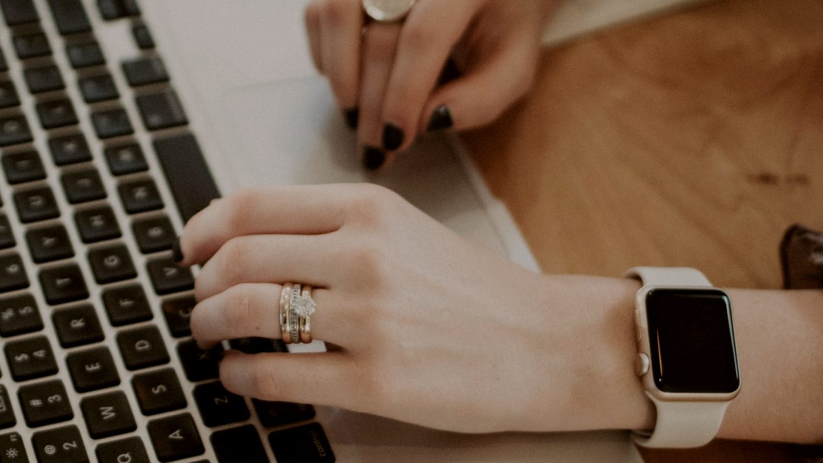 
a-woman-working-on-her-macbook-pro
