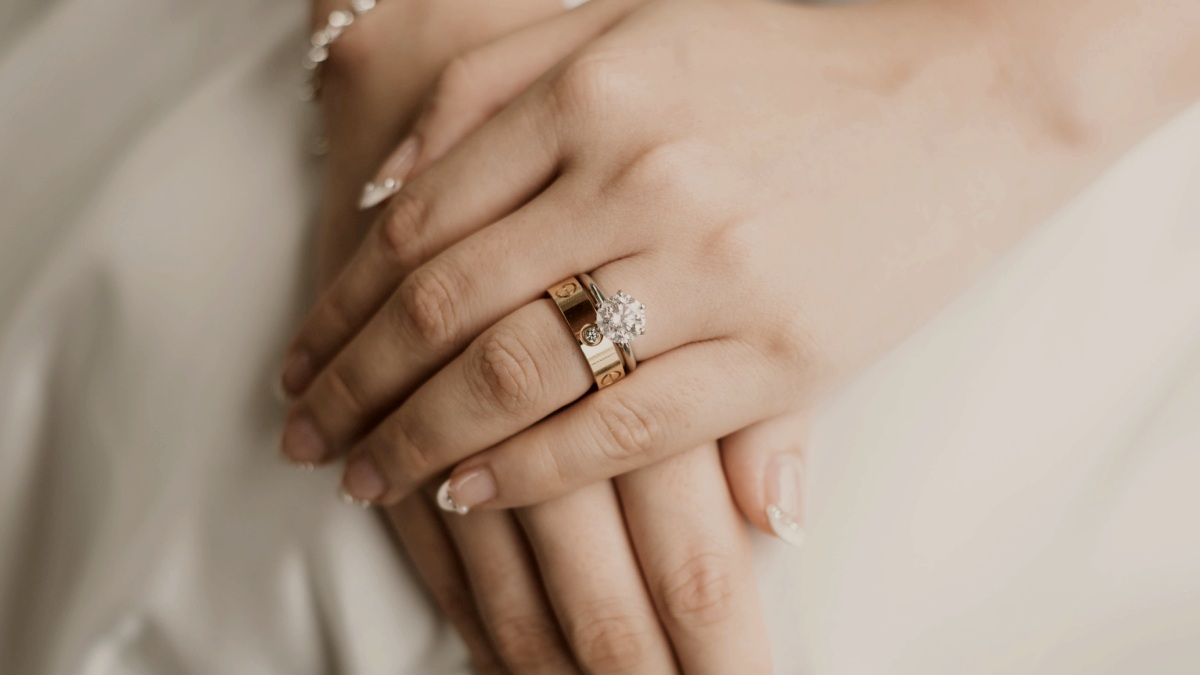 
a-womans-wedding-and-engagement-rings
