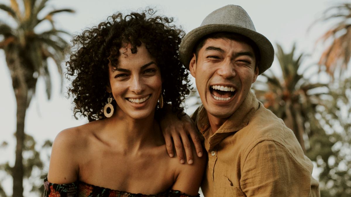 
a young couple having fun at the park
