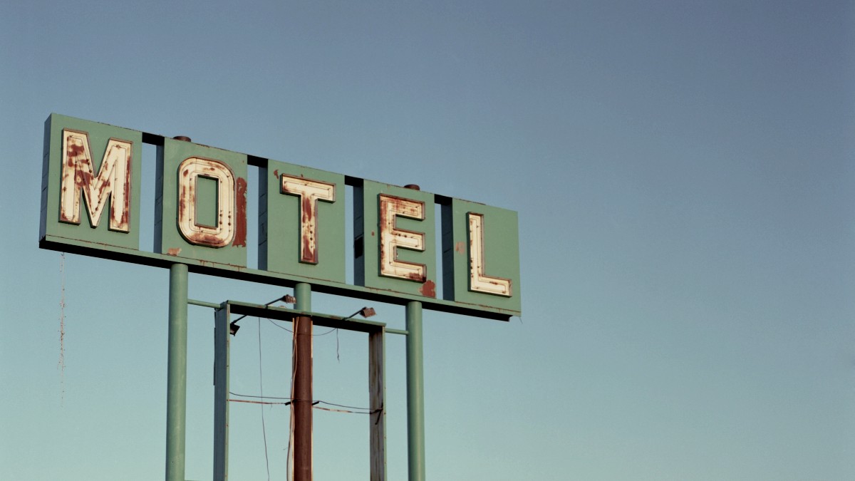
blue and red street motel sign by Kait Herzog
