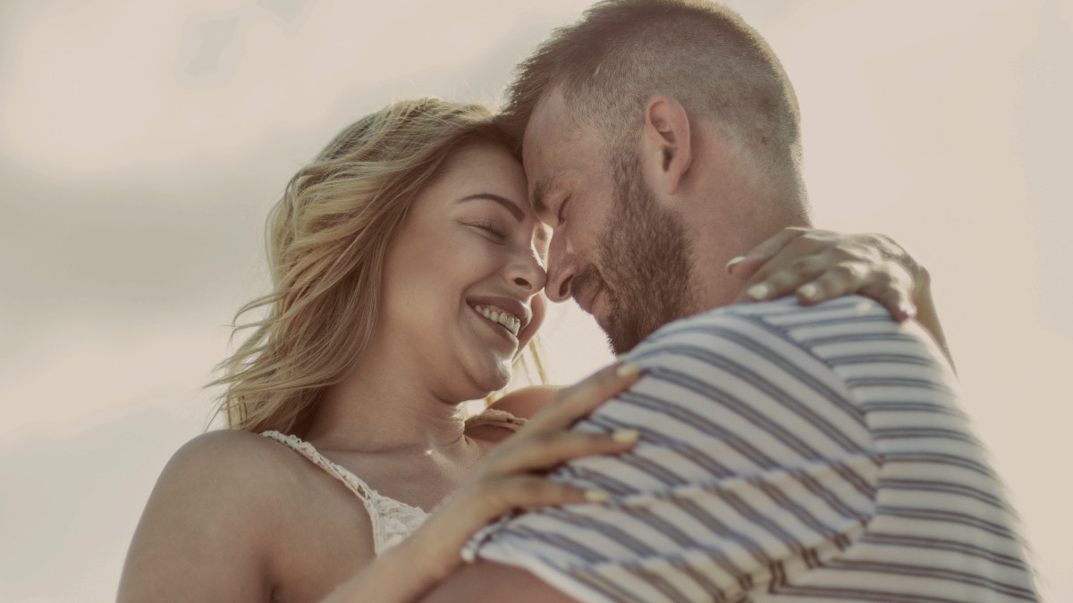 
Couple outdoors embracing outdoors by Getty Images
