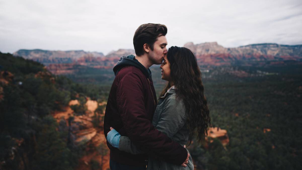 
Friends on a hike, kissing and falling in love.
