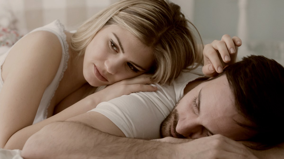Picture of young couple having relationship problems crisis woman overthinking by getty images