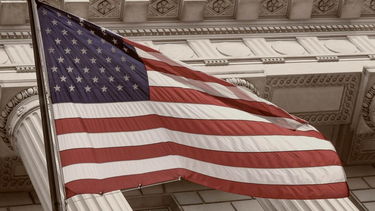 
the-american-flag-blowing-in-the-wind
