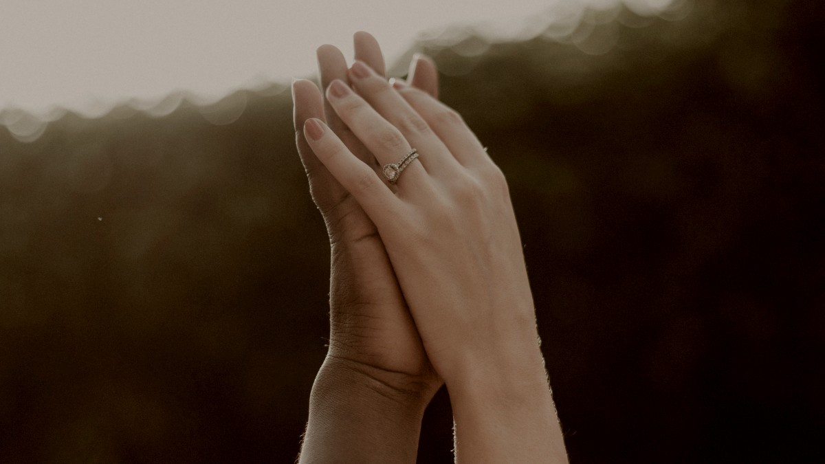 
two hands with out of focus background by Priscilla Du Preez
