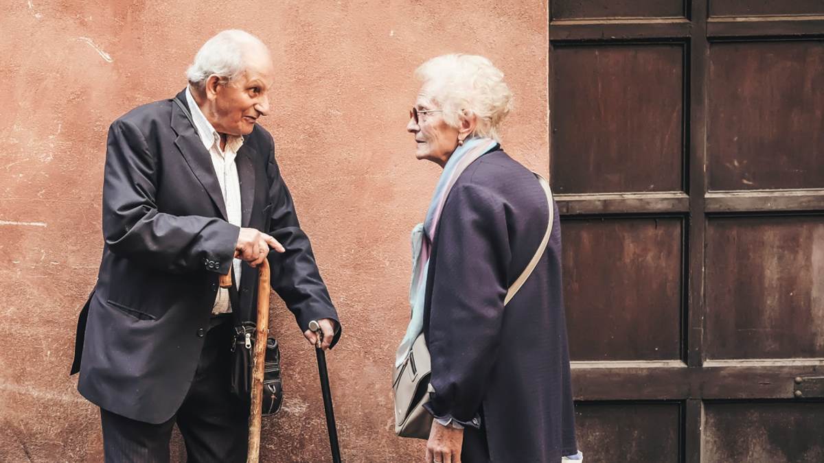 
two-older-adults-giving-each-other-support
