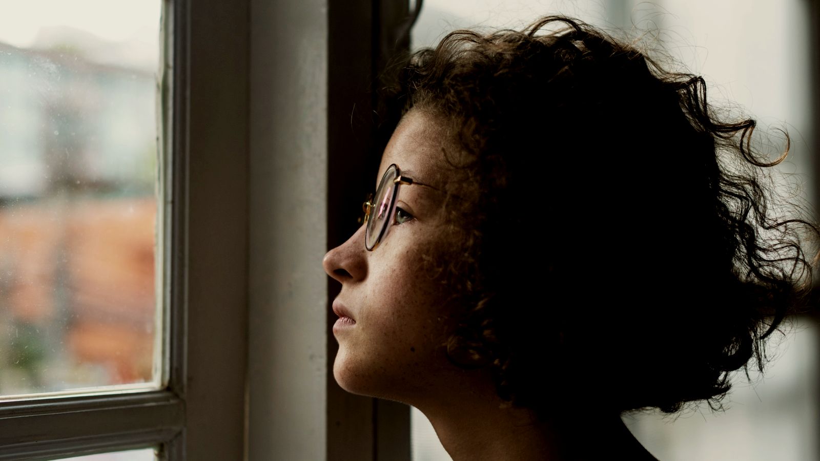 
Young caucasian girl with eyeglasses and short curly hair by Curated Lifestyle
