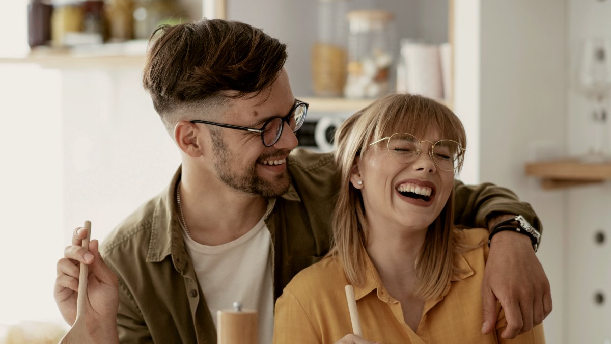 
Young couple preparing spaghetti food at home
