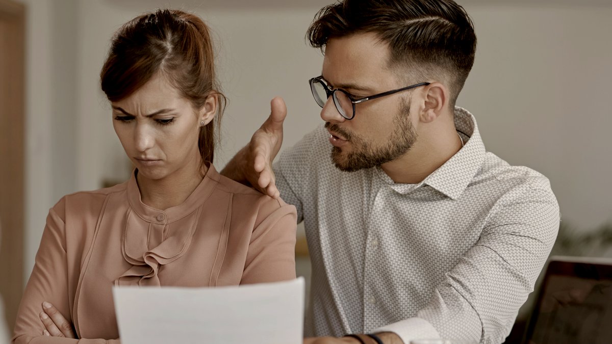 
Young man trying to talk with his stubborn wife by Getty Images
